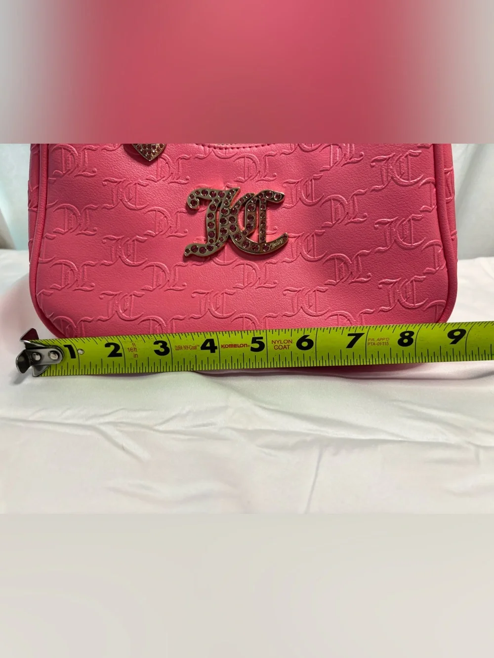 Juicy Couture Embossed hobo Bag with Gold Hardware and Crystal JC Logo